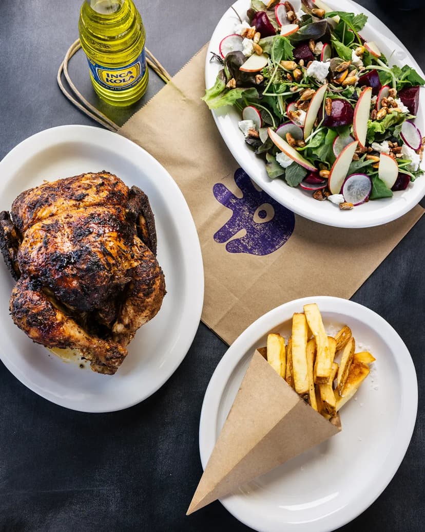 chicken, salad, french fries, and a drink